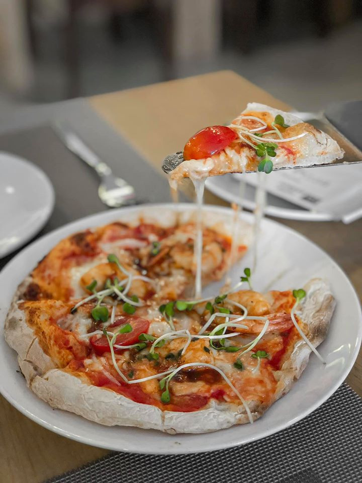 Quattro Formaggi Pizza là một trong những loại pizza nổi bật của Buzza Pizza.